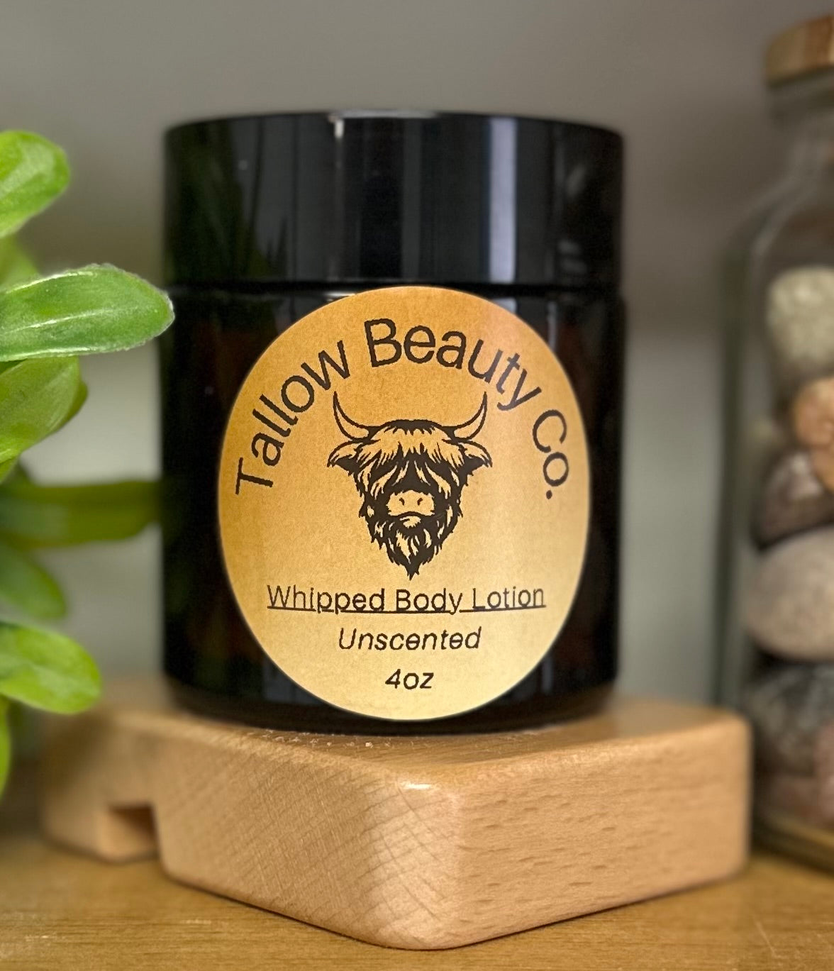 Whipped tallow lotion in glass jar for dry skin